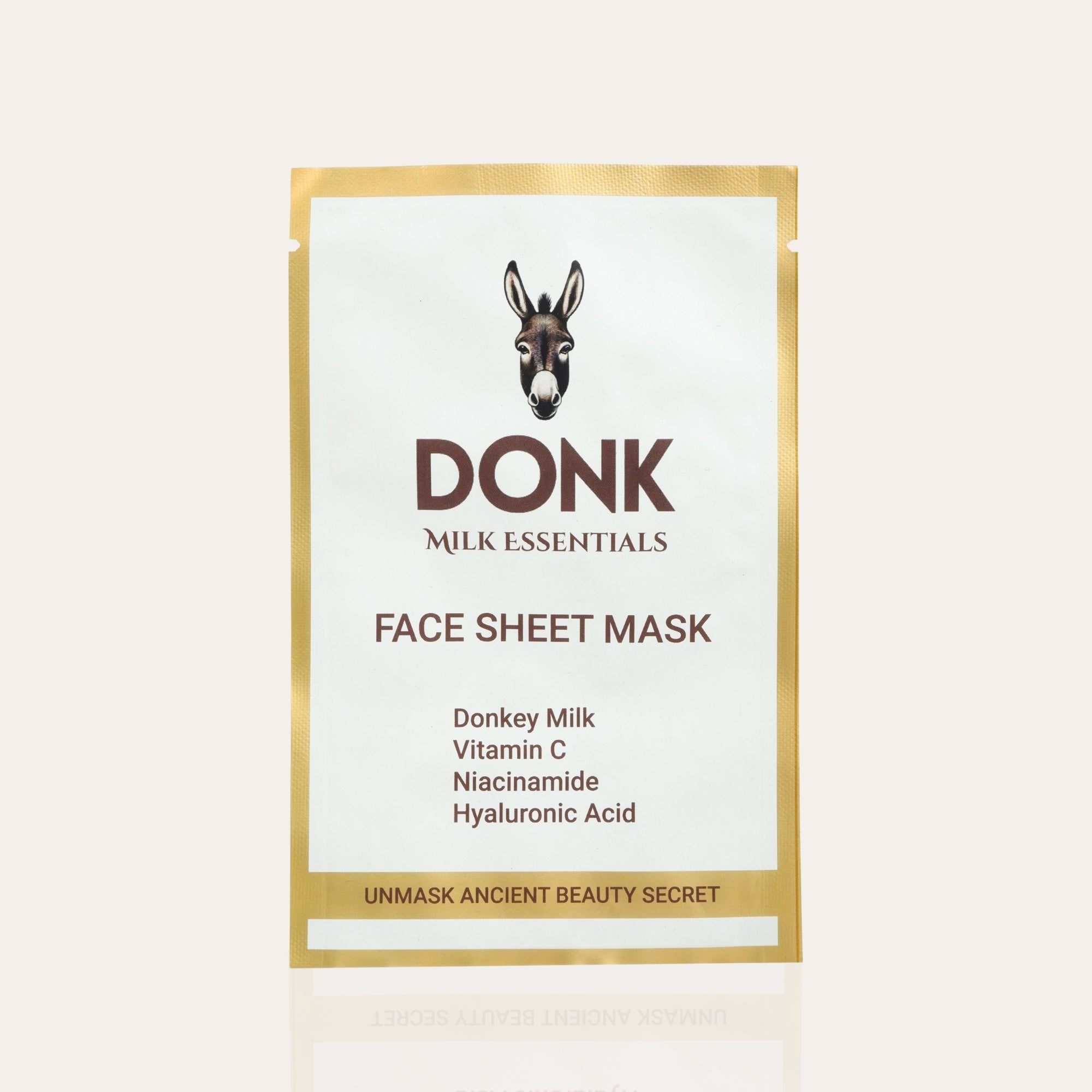 DONK Face Sheet Mask infused with donkey milk, vitamin C, niacinamide, and hyaluronic acid. Hydrates, brightens, and nourishes skin for a radiant glow. Unmask ancient beauty secrets with this skincare essential.