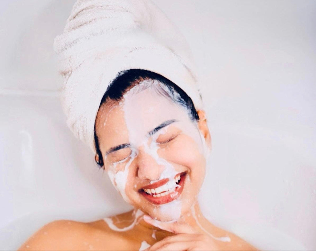 Woman enjoying a luxurious donkey milk bath – Natural skincare ritual for glowing, hydrated skin. Relaxing beauty treatment with nourishing donkey milk, known for its anti-aging, moisturizing, and skin-brightening properties. Spa-like skincare experience for smooth, radiant, and healthy skin.